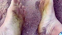 Barefoot Beauty Teases in Natural Sand Setting