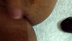 Wife playfully uses dildo at home, amateurs having fun! 😏