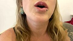 This curvy mature milf with tattoos indulges in gummy bear vore fetish. She swallows them with dirty talk.