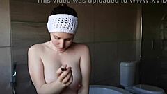 Cute Brunette Babe Smokes While Showing Off Petite Big Tits