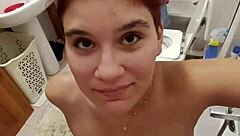 Chiara stands in the bathroom as the old European guy pisses on her tits like a slave whore.