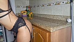 The maid gets aroused while cleaning the kitchen and starts masturbating intensely.