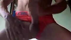 Latina in red teases black amateur with her curves