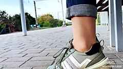 Tan nylon soles tease on bench