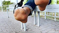 Tan nylon soles tease on bench