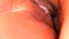 Ebony girl intensely sucks huge black cock bent over