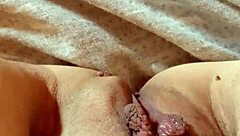 Milf opens her pussy wide.