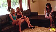 The bratty BRUNETTE got calmer when the two blonde LESBIANS used their mouths for licking and fingering her big tits and pussy