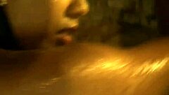 sensual brunette undresses slowly in erotic striptease dance