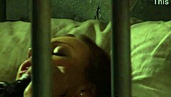 Slutty lesbian slave bound in hardcore bondage masturbates to orgasm.