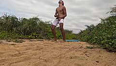 African handjob leads to cumshot on the beach
