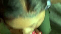 in the ghetto house, she gives sloppy head to a big cock