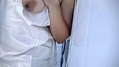 Chubby babe gets wet from playing with her big tits