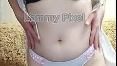 Horny brunette Lammy Pixel stripteases and shows off her gorgeous ass
