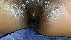 Black ebony woman masturbates in close up