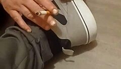 Why is my friend having so much fun trashing my sneakers? Provocative foot fetish scene.
