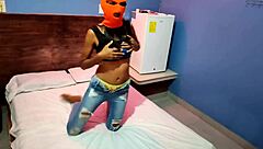 my brunette stepsister tells me she wants to celebrate halloween in a hotel bed she put on a mask and shakes her body and hips very sexy finally she getts naked for me