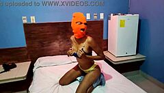 my brunette stepsister tells me she wants to celebrate halloween in a hotel bed she put on a mask and shakes her body and hips very sexy finally she getts naked for me