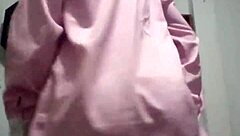 The black wife dances seductively for her lover on the marital bed, eager for his cum.