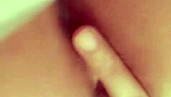 is this redhead slut fingering her hairless pussy for you?