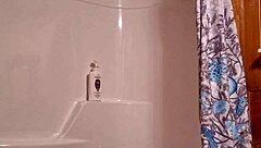 A sneaky video captures me preparing for a relaxing shower in the bathroom.