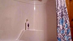 A sneaky video captures me preparing for a relaxing shower in the bathroom.