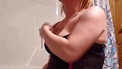 A sneaky video captures me preparing for a relaxing shower in the bathroom.