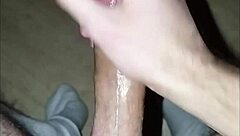 This young 18+ amateur guy starts massaging his huge cock solo, leading to intense orgasm and cum.