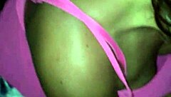 mature blonde interacts with young person in public outdoor setting