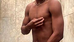 amateur gives soapy massage to big cock in shower, nearly caught