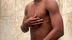 amateur gives soapy massage to big cock in shower, nearly caught