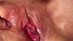 shaved blonde milf spreading her wet hairless pussy close up