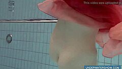 katya okuneva looks amazing in her red dress by the pool