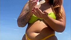 Oh, flashing my big pussy on the beach!