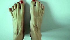 close up of footjob with cum on feet and eating it