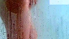 Watch this latina teen's shaved pussy in the shower?