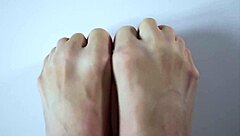 close up of footjob with cum on feet and eating it