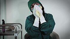 nurse uses latex gloves in hospital fetish play
