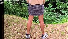 Shemale with ladydick pees in the park casually