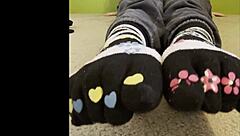 teen worships sexy feet and toes, licking and sucking on butts in fetish scene