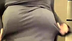 The Pregnant Stepmother Exposes Her Milky Tits