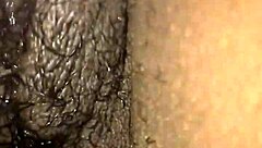 ebony babe plays with wet pussy using vibrator and huge black cock toy.