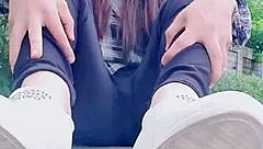 Tingting, the crossdressing shemale, slips into stockings and masturbates outdoors suggestively