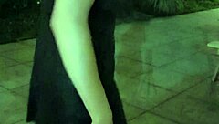 ting xuan strolls through the community garden in heels and shoes