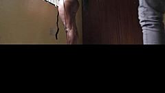 dramatic indoor scene with woman in black leggings