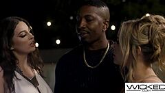 inked brunette licks pussy in threesome.