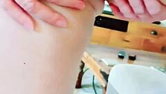 Mature woman spreads her huge pussy lips close-up