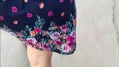 Madura flashes upskirt in street skirt on public sidewalk then offers herself for outdoor fun