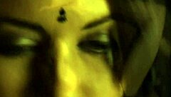 Beautiful brunette from Bollywood dances in a cute teasing way.