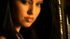 Beautiful brunette from Bollywood dances in a cute teasing way.